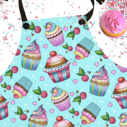 The Whimsical Cupcake Apron, brings a dash of sweetness to your kitchen with a fun and super-sweet design! Featuring a vibrant aqua background and adorable cupcake illustrations