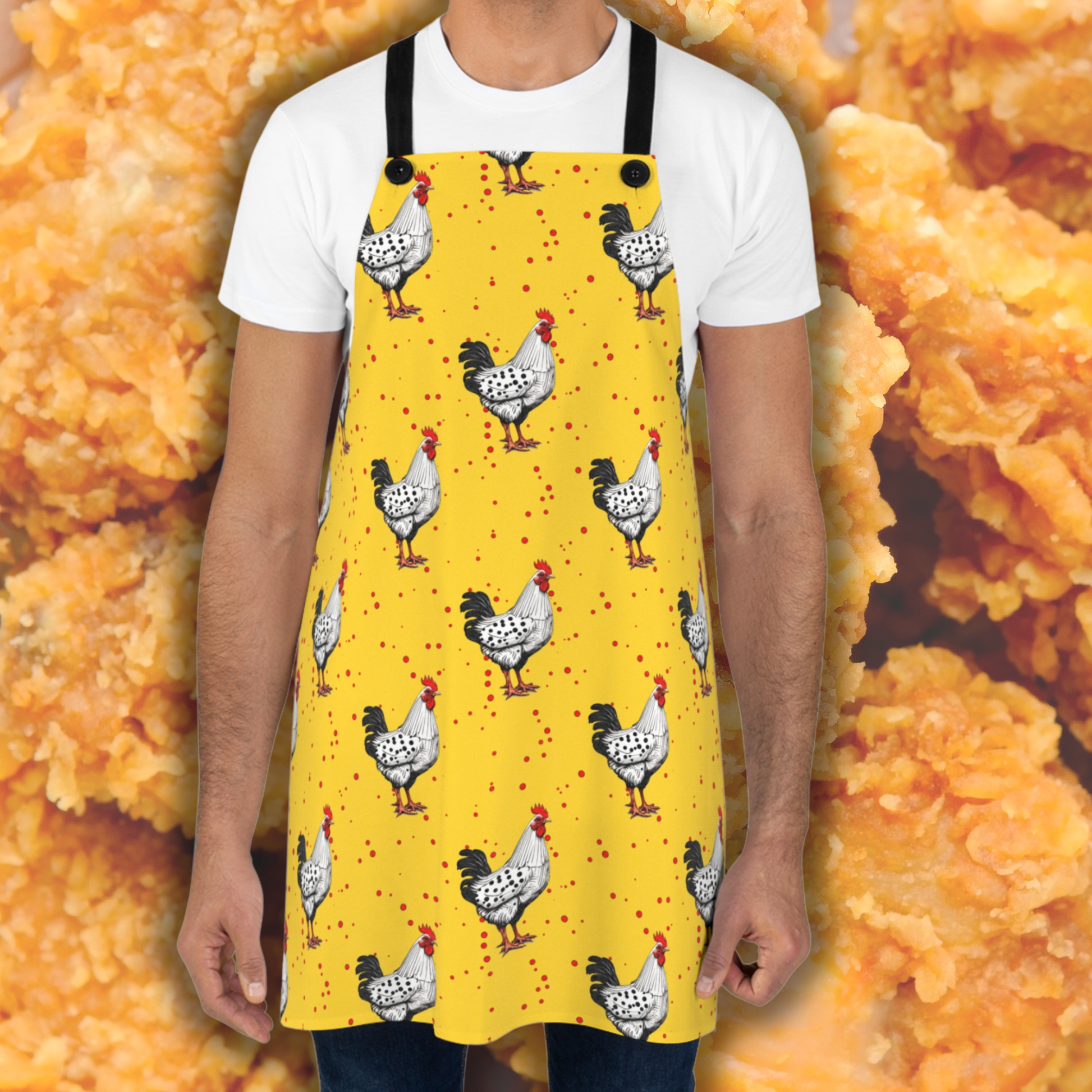 A man wearing a fun and whimsical Yellow Chicken apron. A fun, yet practical, addition to your kitchen and BBQ cooking adventures.